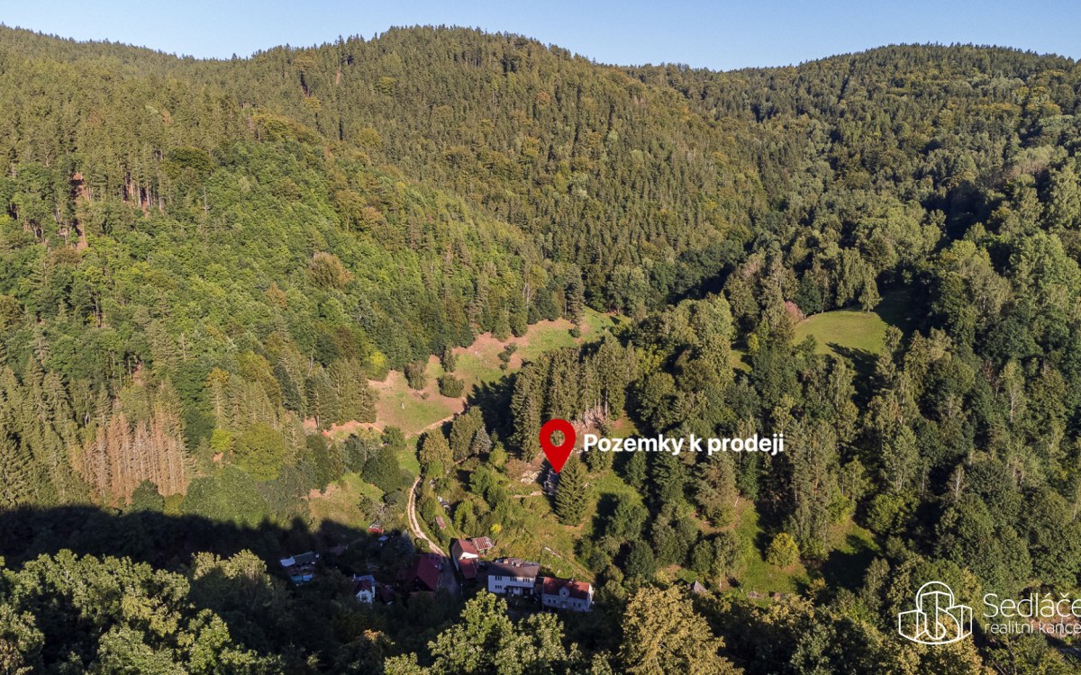 Svažitý pozemek nabízíjící realizaci stavby s výhledem na  zalesněné svahy! – fotografie 1